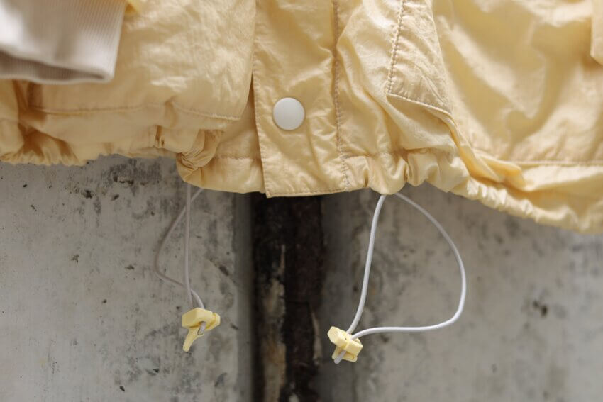 アワーレガシーのパッファージャケットの裾